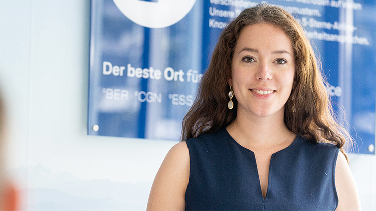 A smiling woman at Lufthansa Aviation Training Headquarters